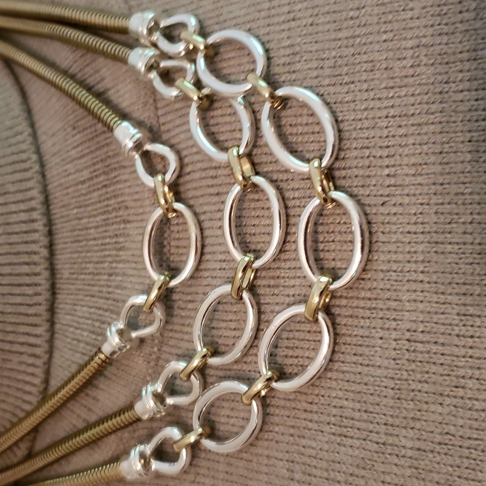 Very pretty silver and gold set.  Necklace, earrings and bracelets. - Picture 2 of 4